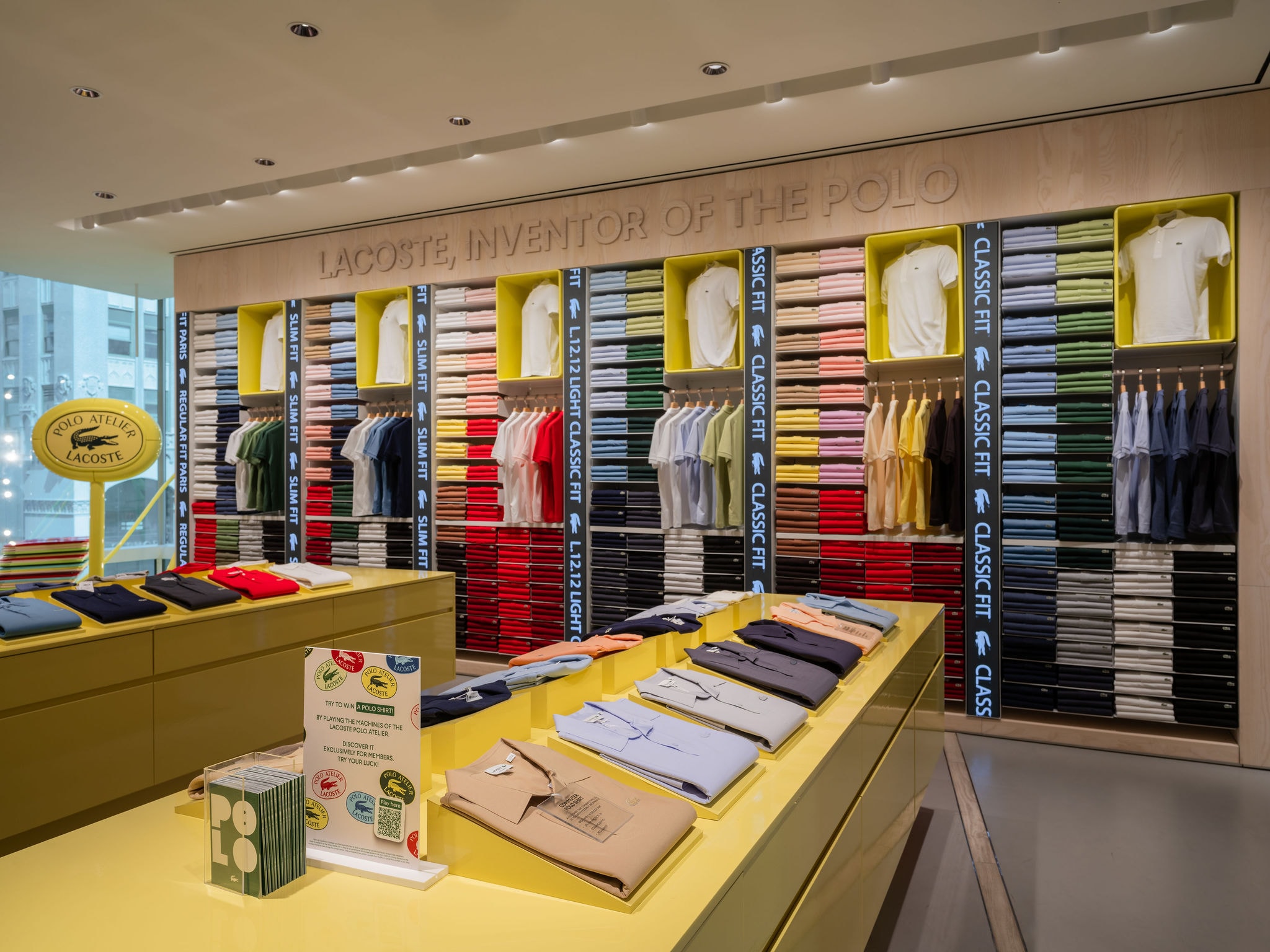 Lacoste store interior blue polo display