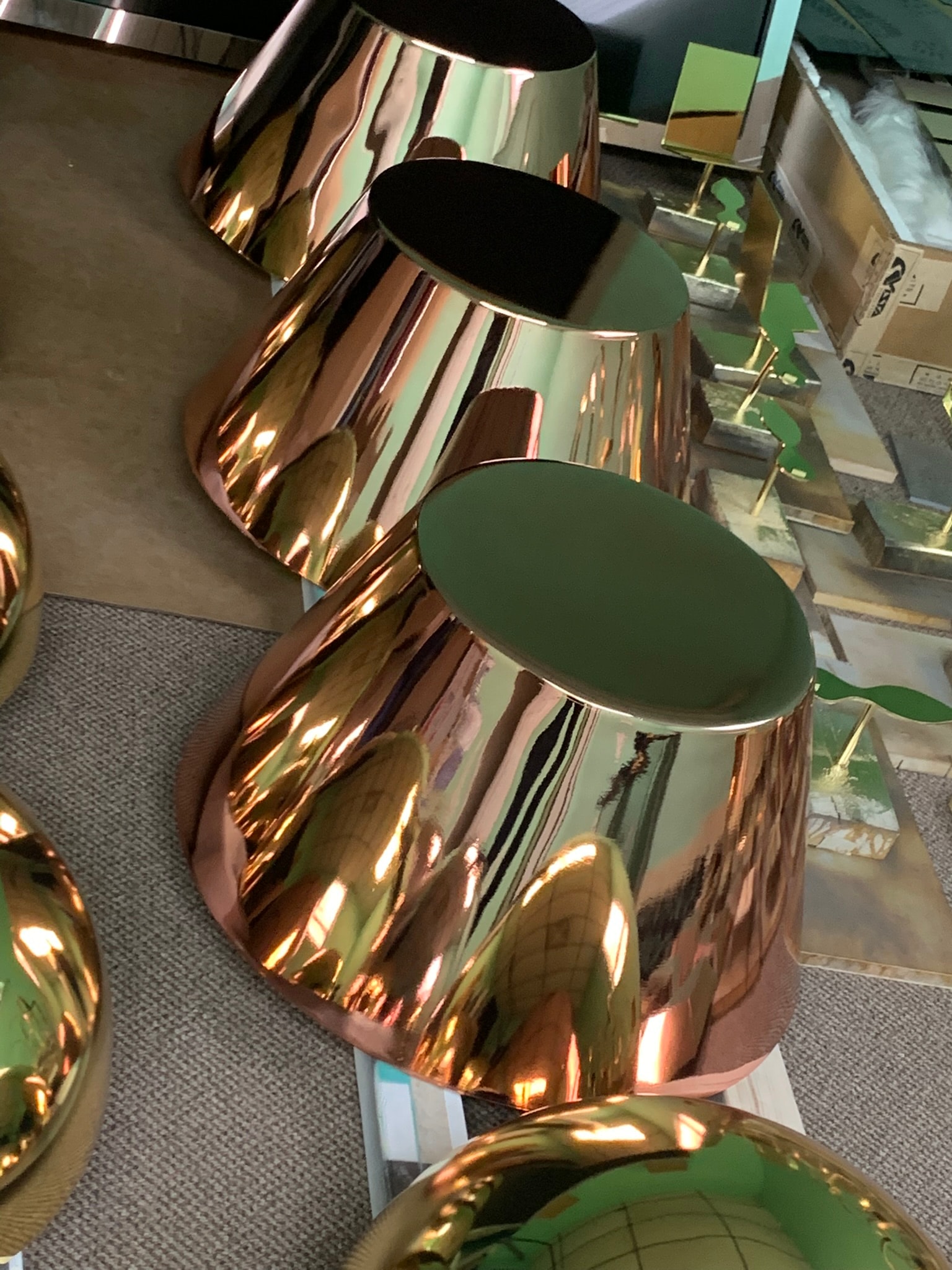 Polished gold sphere sculptures fabricated in-house at Vista Visual Group